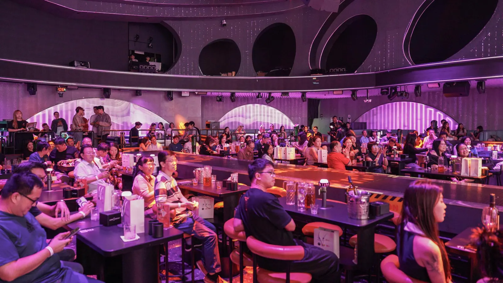 Full auditorium at a Pink in Public showcase