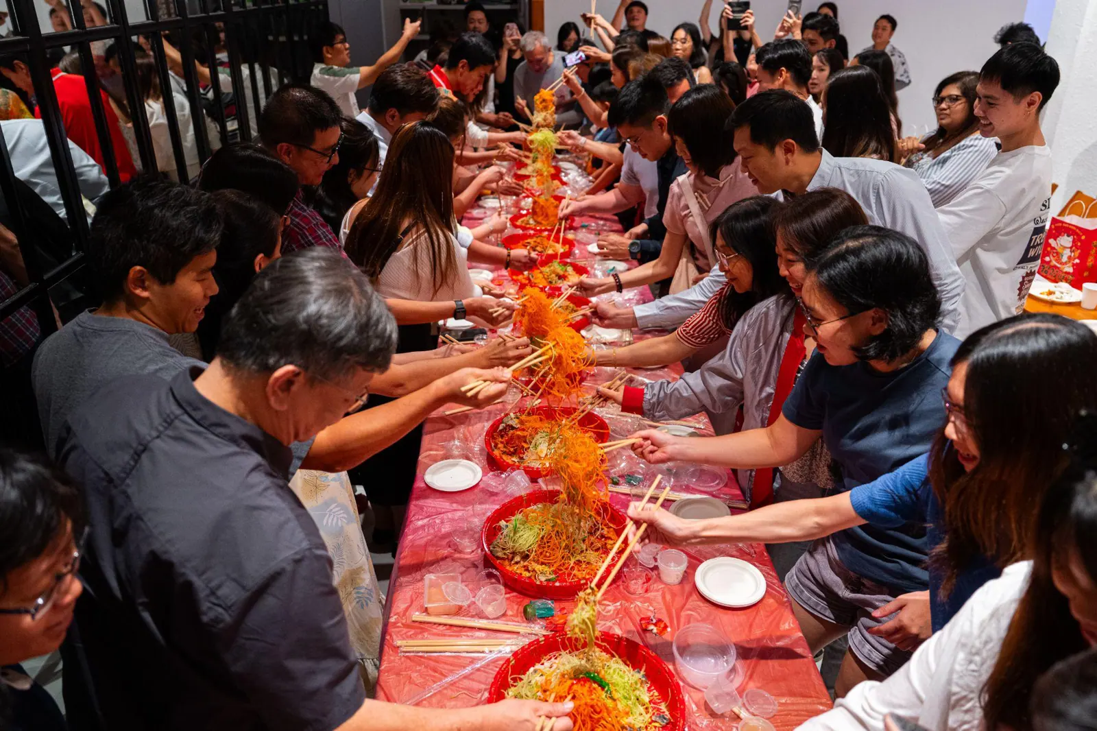 Guests sharing a meal at a Pink in Public gathering