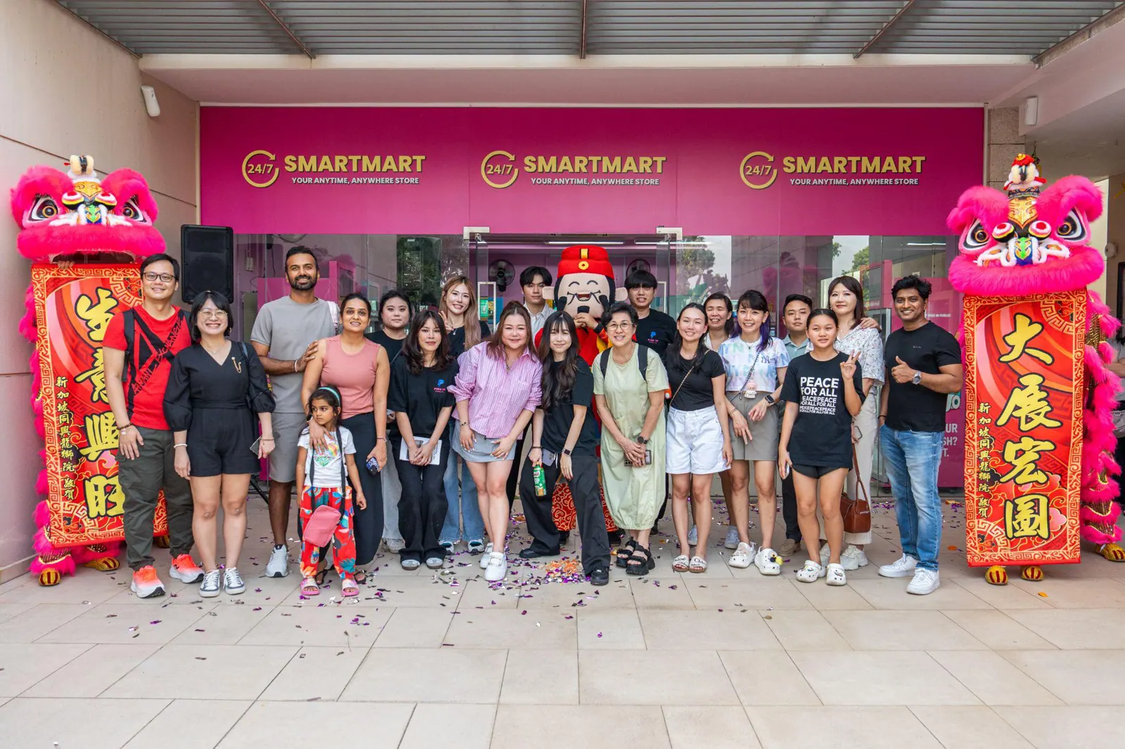Team, partners and guests at a Pink in Public smart retail opening